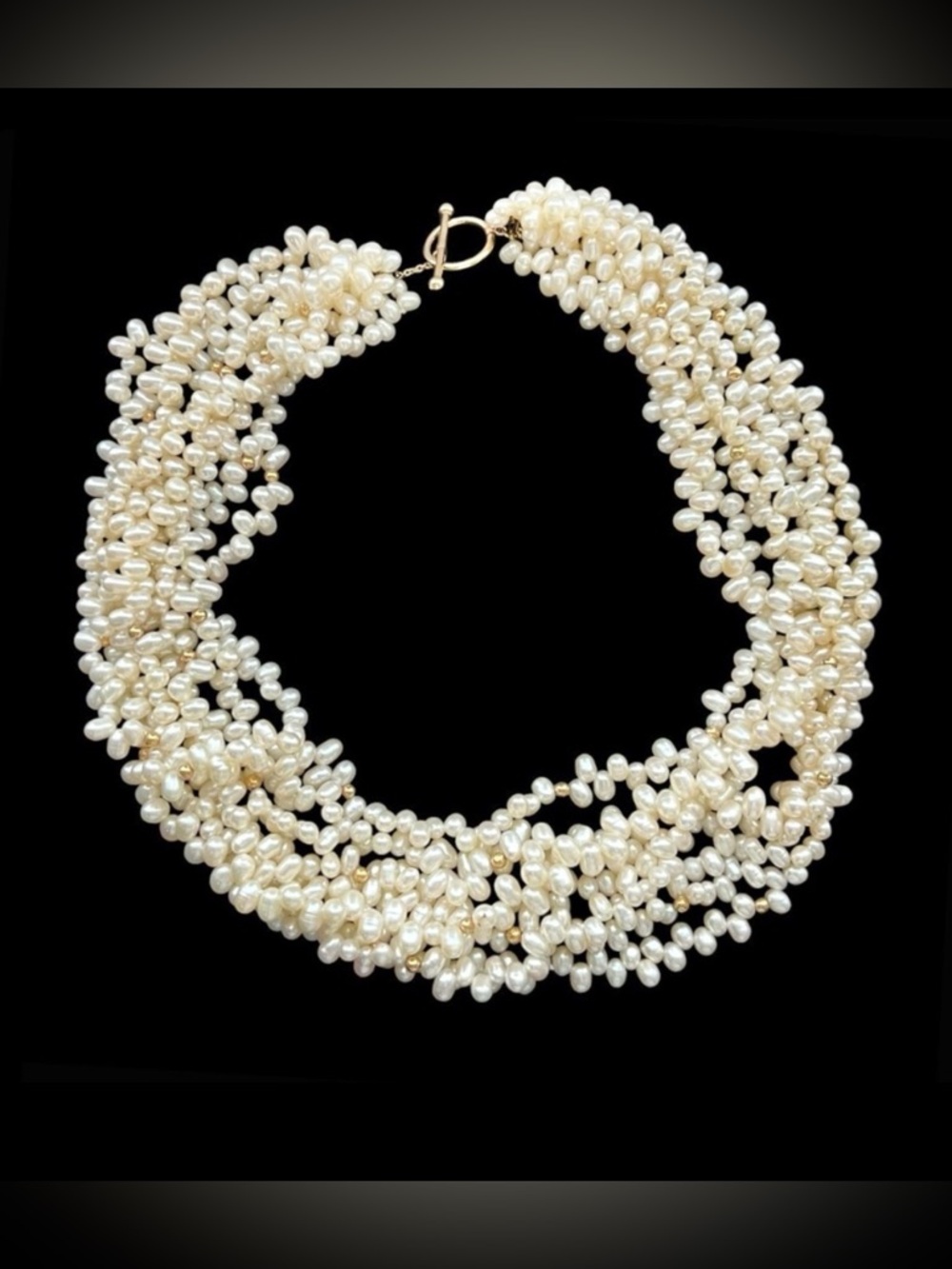 Zoe B 14k gold eight strand freshwater pearl necklace with toggle closure